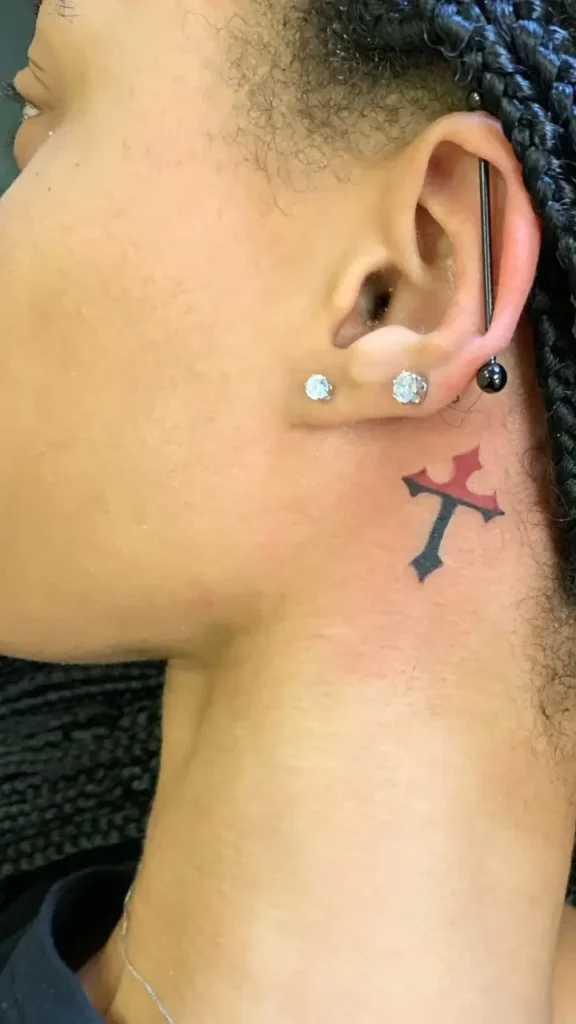 Tiny Cross Tattoo