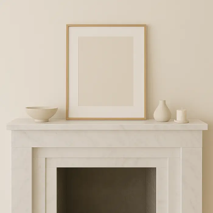 Contemporary fireplace mantel styled with sleek neutral accessories.