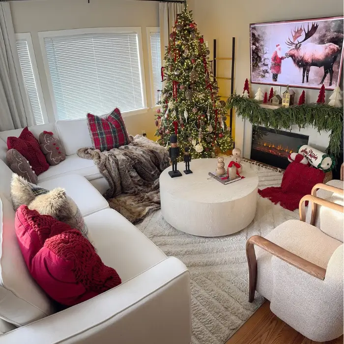Ralph Lauren-inspired Christmas living room with plaid and gold accents.
