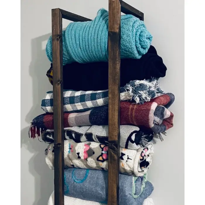 Fold Blankets on an Open Shelf or Cabinet