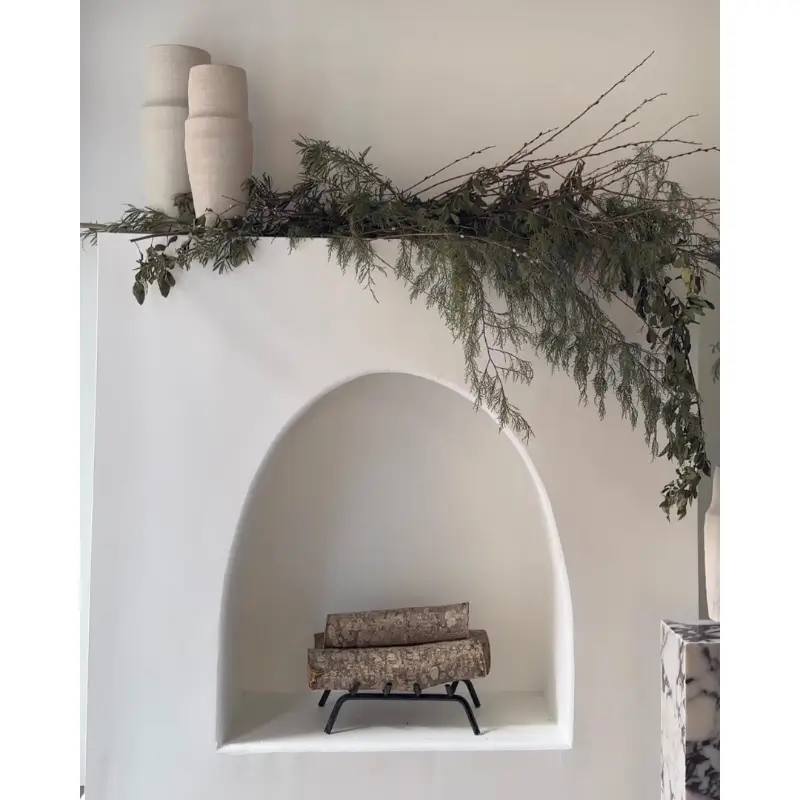 Arched Plaster Fireplace – Soft, Romantic Curves