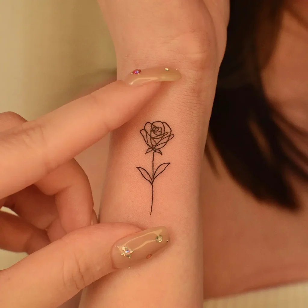 Birth Flower Fine Line Tattoo – Identity, Personality, and Self-Connection