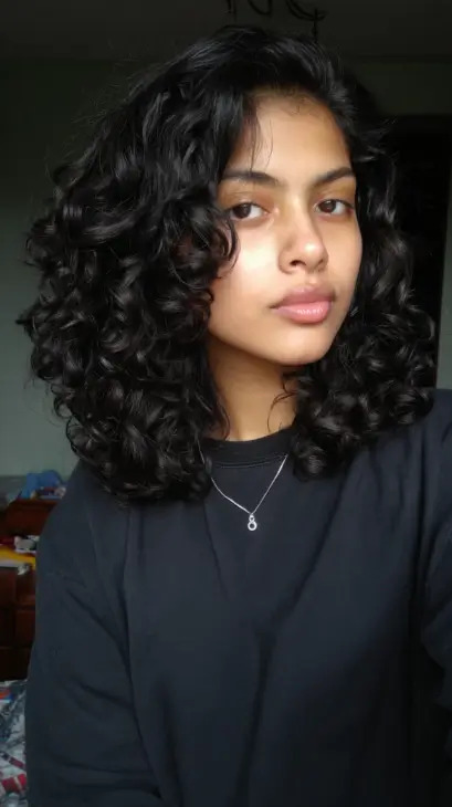 Defined Black Curly Shoulder Crop